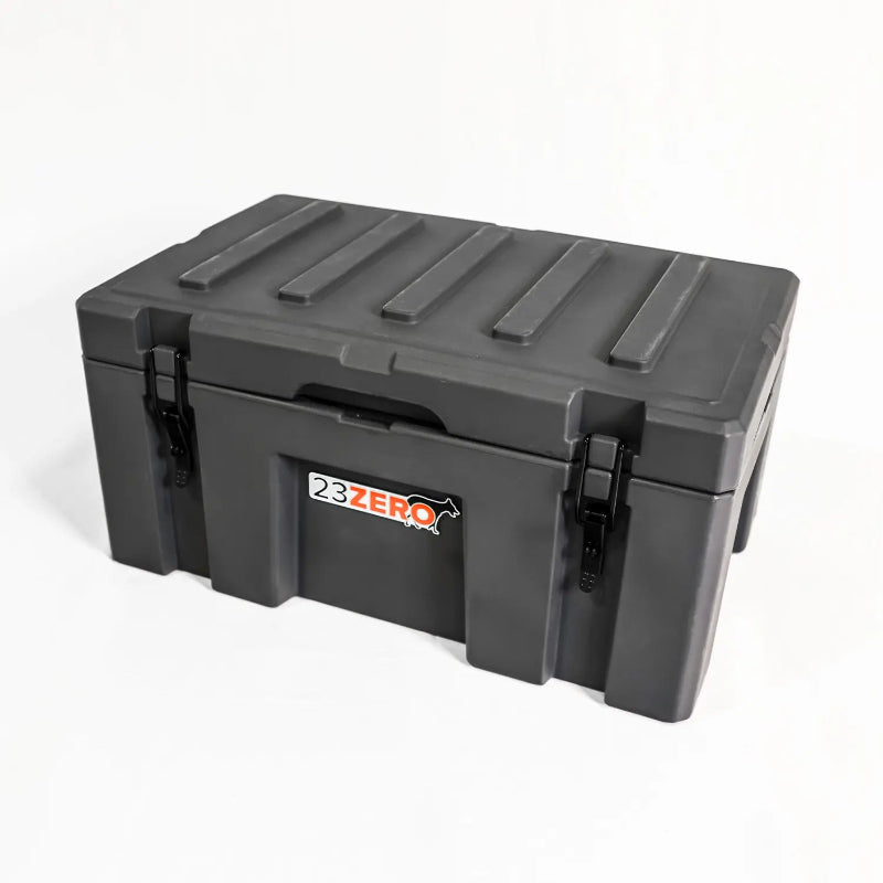 Image of a closed grey 23ZERO storage box with black latches, angled front and side view on a white background.