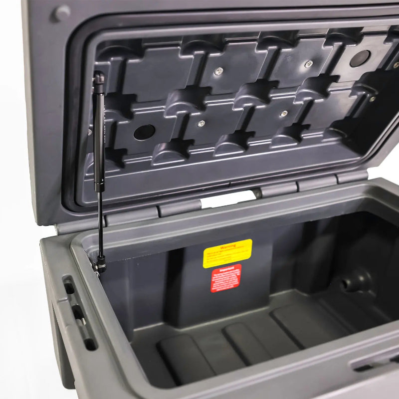 Image of a grey storage box with its lid open, revealing the interior and a gas strut, angled side view on a white background.