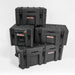 Image of a stack of four grey 23ZERO storage boxes of varying sizes, with the largest at the bottom having wheels, angled front and side view on a white background.