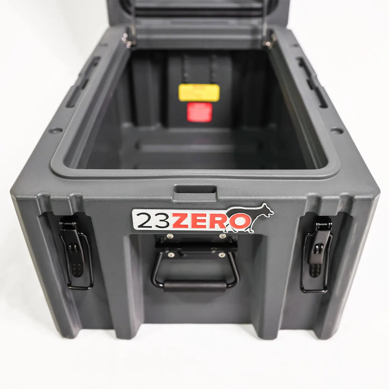 Image of an open dark gray 23ZERO storage box, revealing the interior from a top-down angled view on a white background.