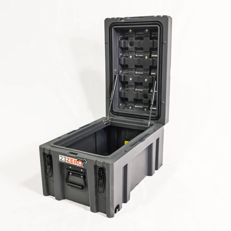 Image of a grey 23ZERO storage box with its lid fully open and supported by two gas struts, revealing the spacious interior, angled front and side view on a white background.