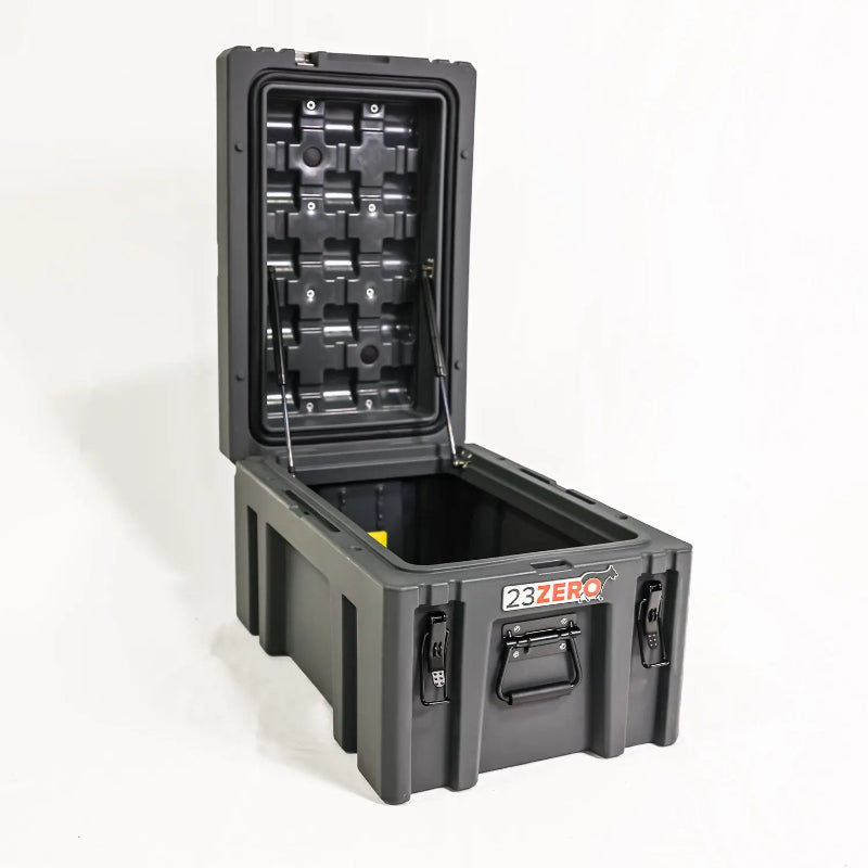 Image of a grey 23ZERO storage box with its lid fully open and supported by two gas struts, revealing the spacious interior, angled front and side view on a white background.