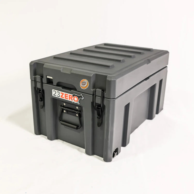 Image of a dark gray 23ZERO storage box with black latches and handle, angled front and side view on a white background.
