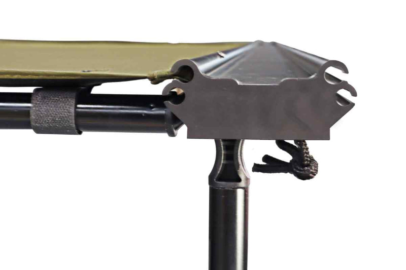Close-up image focusing on the corner mechanism of a Peregrine Awning, showing the green fabric attached to a black support frame and pole. The intricate dark metal joint is clearly visible against a white background