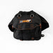 Image of a black 23ZERO spare tire storage bag, shown unmounted and slightly collapsed, with orange stitching, black straps, and metal D-rings, against a white background.