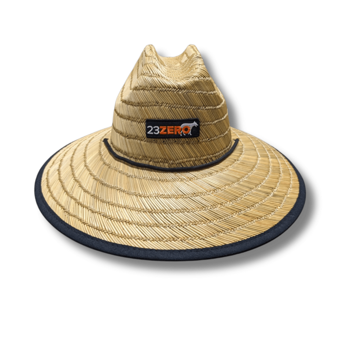 Image of 23ZERO woven straw sun hat with wide brim and black trim, front view on black background.