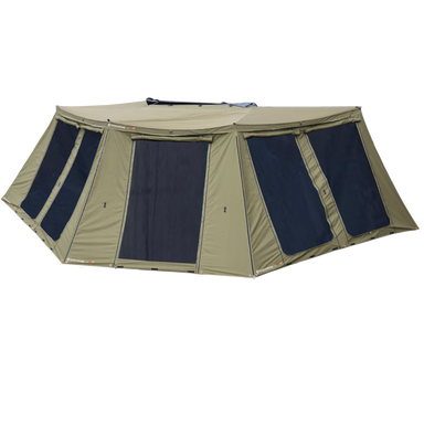 Image of the 23ZERO Peregrine 270 Deluxe Wall Set for an awning, fully set up. The walls are a khaki color with large black mesh windows and a zippered door. The awning wall is shown from a front-and-side view against a simple gray background