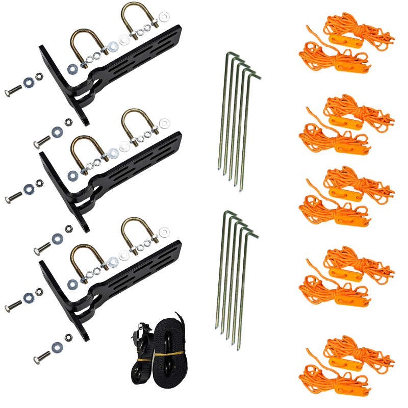 Image of complete awning mounting and tie-down kit laid out flat, featuring black metal brackets with U-bolts and hardware, steel ground stakes, orange guy ropes with tensioners, and black straps, top-down view on a solid background.