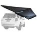 Image of a Peregrine PRO 180 Awning partially deployed with LED lights on, showing an angled back and side view. The black awning is mounted on a ghosted-out white SUV, providing shelter over the back and side of the vehicle