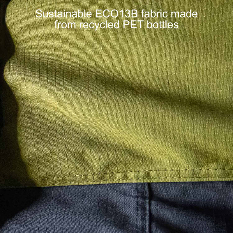 Image of a close-up of the 23ZERO Peregrine Awning's green ECO13B fabric, which is a sustainable material made from recycled PET bottles. The ripstop weave and double-stitched seam are visible