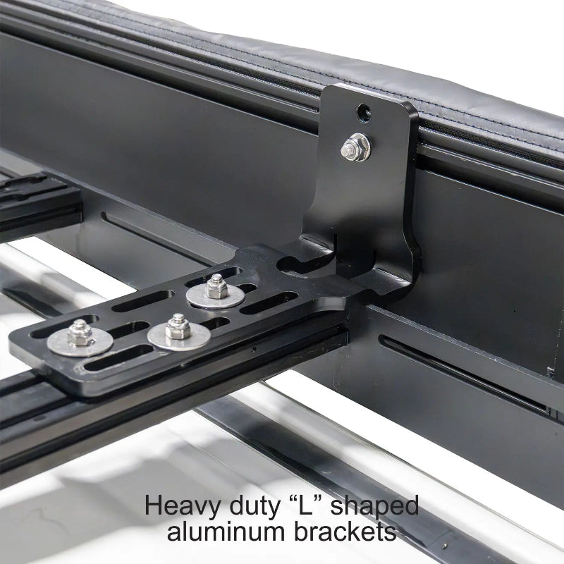 Image of a close-up of the heavy-duty, black "L" shaped aluminum mounting bracket for the 23ZERO Peregrine 180 Compact Awning. The bracket is secured with multiple bolts to a roof rack, highlighting its robust construction