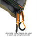 Image of a close-up of the anti-rattle zipper heads and orange pulls on a 23ZERO Peregrine Awning. The zipper is shown with a section of the green and black awning fabric, highlighting the quality of the components