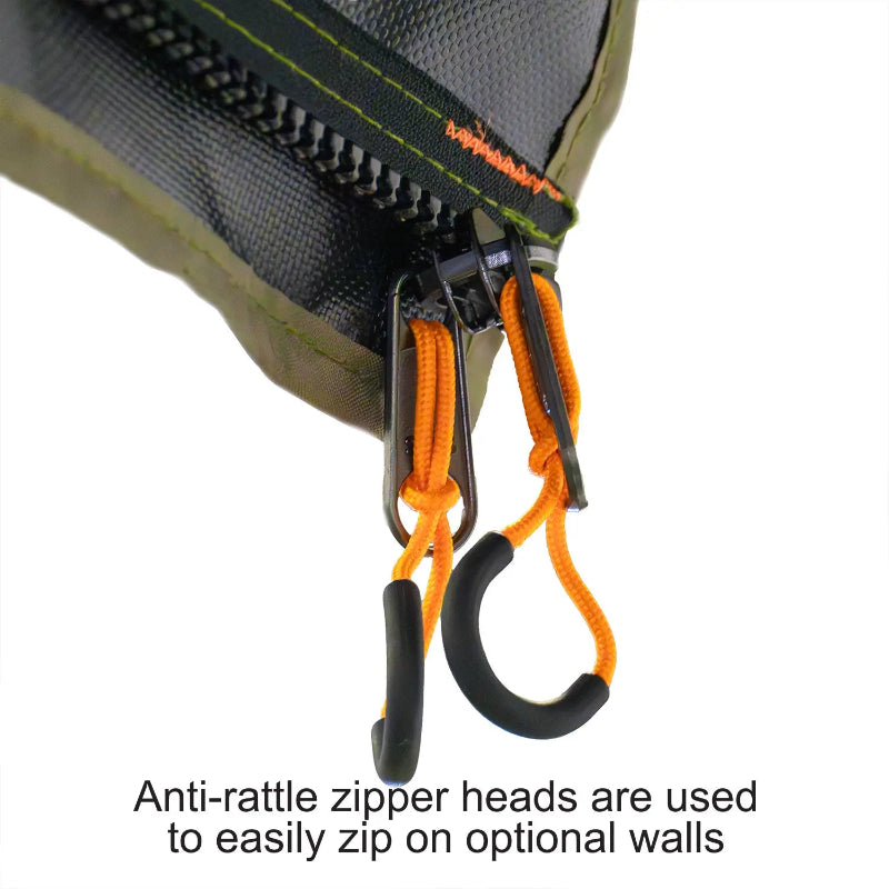 Image of a close-up of the anti-rattle zipper heads and orange pulls on a 23ZERO Peregrine Awning. The zipper is shown with a section of the green and black awning fabric, highlighting the quality of the components