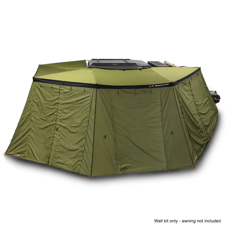 Image of the OVS Peregrine Pro 270-degree awning with solid olive green walls fully deployed, forming an enclosed room attached to a vehicle, with a note 'Wall kit only - awning not included' at the bottom, all on a white background
