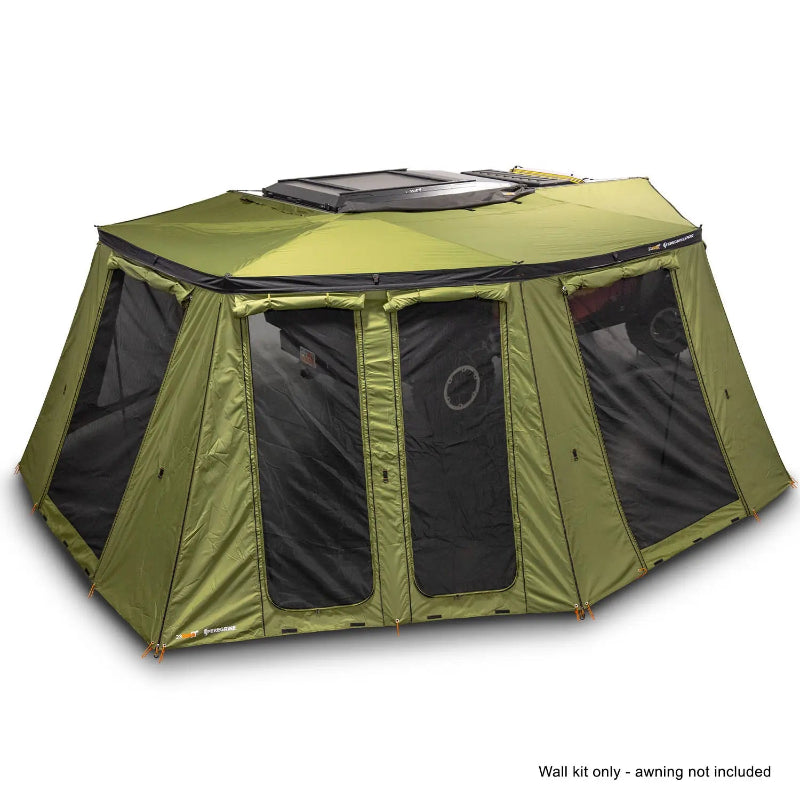 Image of an OVS Peregrine Pro 270-degree awning with olive green walls, featuring large mesh window and door panels, fully deployed and attached to a vehicle, with a note 'Wall kit only - awning not included' at the bottom, all on a white background