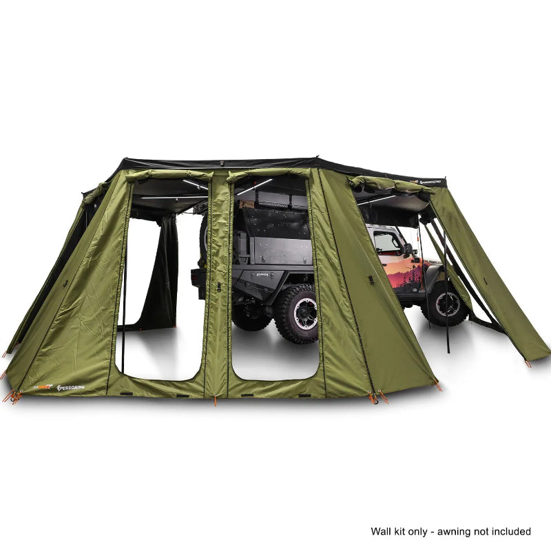 Image of an OVS Peregrine Pro 270-degree awning with olive green walls deployed and open, revealing a vehicle inside the spacious enclosure, with a note 'Wall kit only - awning not included' at the bottom, all on a white background