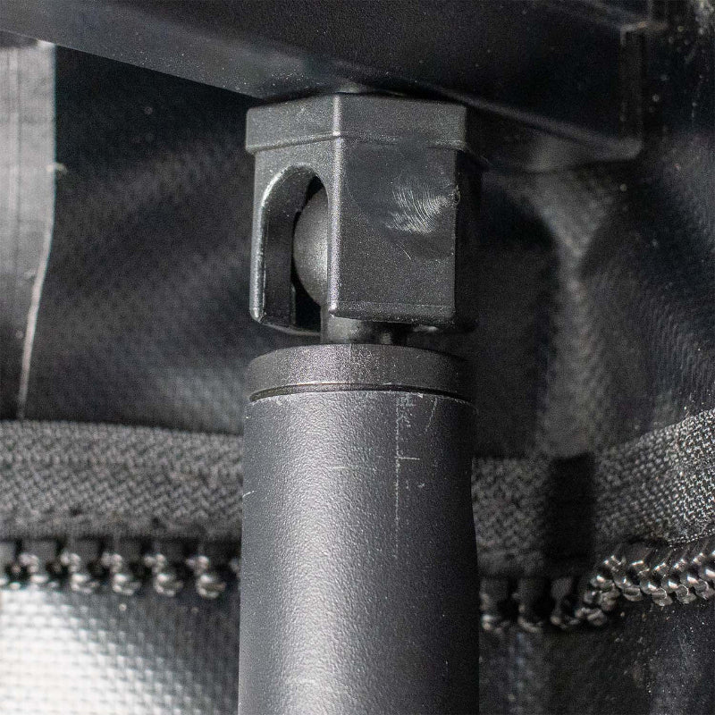 Close-up image of ball socket joint on Peregrine Pro 5-arm awning, black frame and joint detail on a textured background