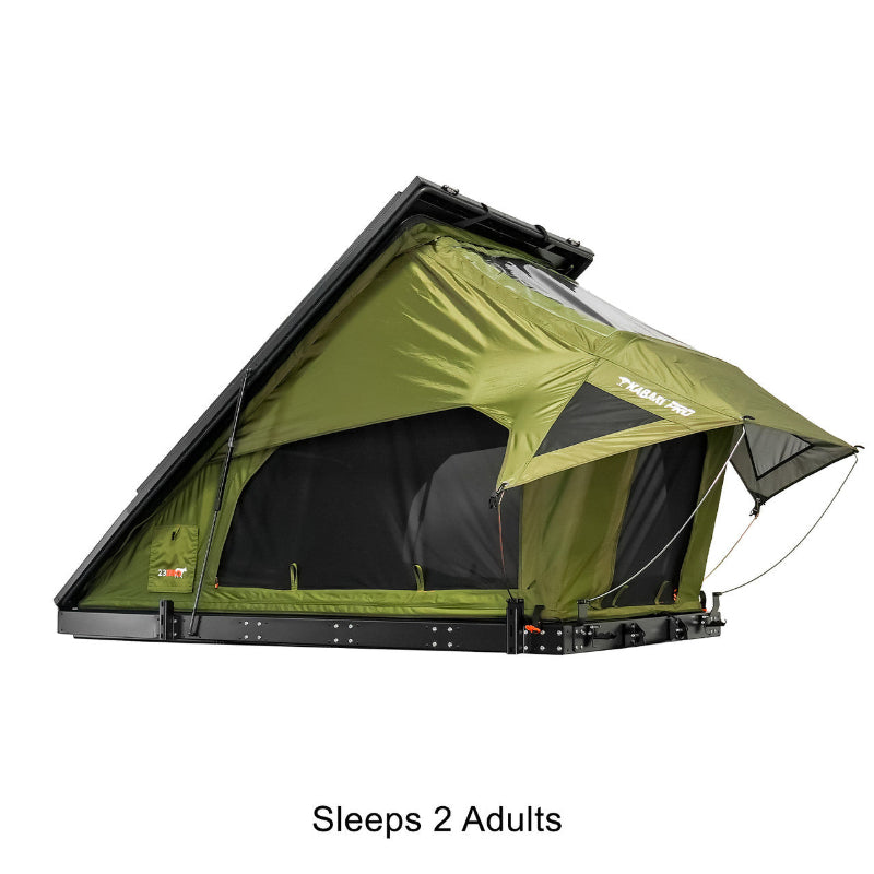 Angled side view of Green Kabari Pro Rooftop Tent with extended awning and black clamshell shell on white background