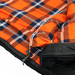 Image of a close-up of a sleeping bag with a vibrant orange, blue, and white plaid flannel interior, featuring a black zipper detail along the edge.