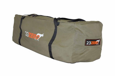 Image of 23ZERO heavy-duty storage duffel bag, olive green canvas with black carry straps and white/orange logo, angled front and side view on white background.