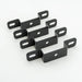 Image of four black powder-coated steel Z-shaped mounting brackets with slotted end holes and center round holes, angled front view on white background.