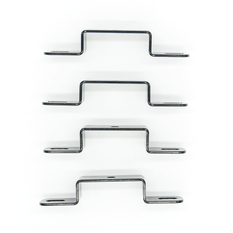 Image of four silver steel Z-shaped mounting brackets with slotted end holes, side profile view aligned vertically on white background.