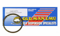Image of Old Man Emu OME95PF5 front coil spring trim packer ring for Prado, circular spacer displayed in front of branded packaging on white background.