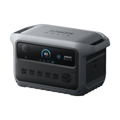 Image of Anker SOLIX portable power station with digital display and multiple AC outlets, rugged gray casing, front angled view on black background.