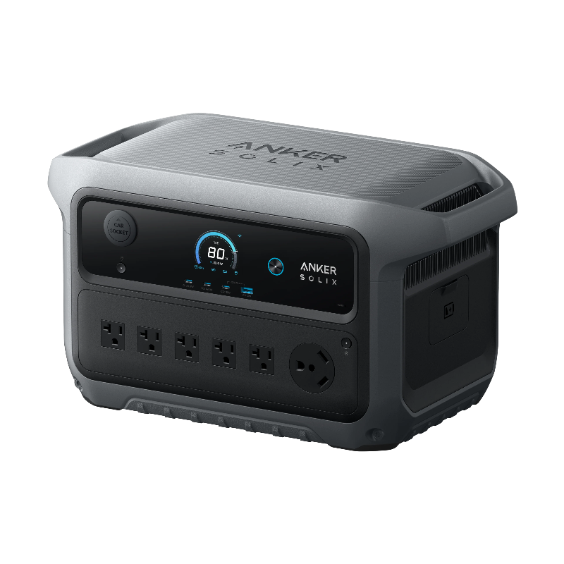 Image of Anker SOLIX portable power station with digital display and multiple AC outlets, rugged gray casing, front angled view on black background.