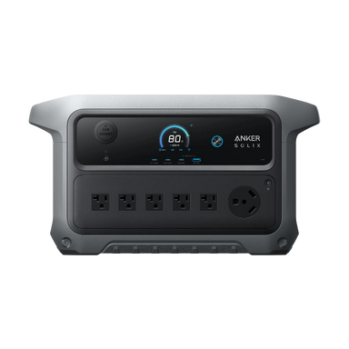 Image of Anker SOLIX portable power station with digital LCD display, multiple AC outlets and car socket, rugged gray housing, straight-on front view on black background.