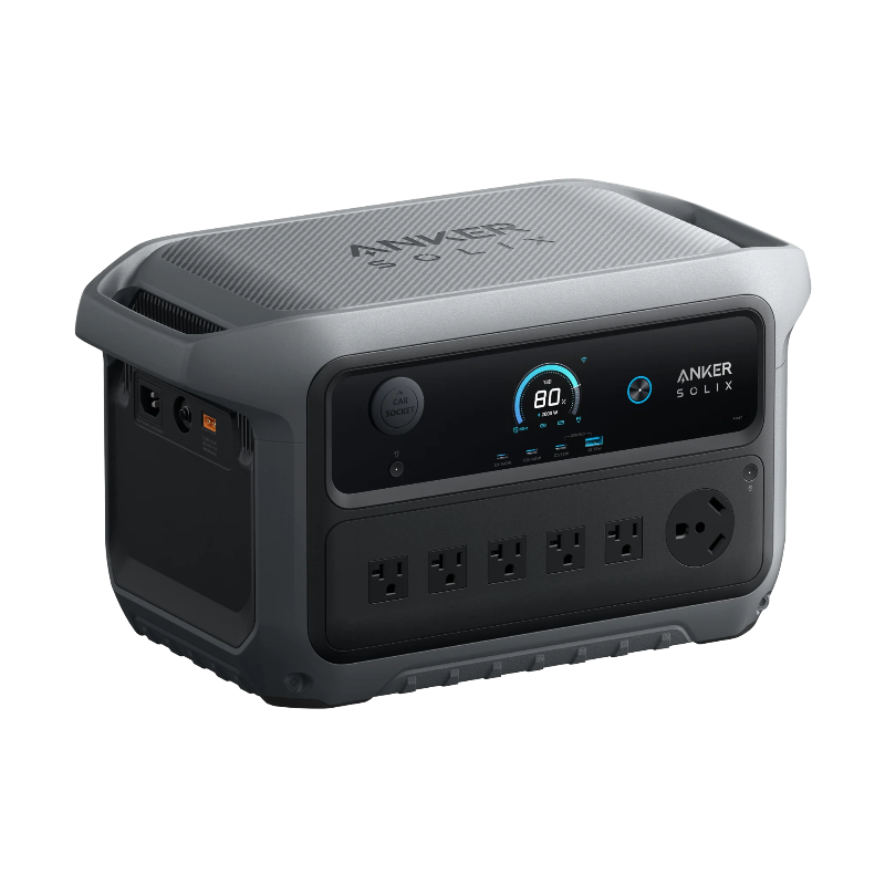 Image of Anker SOLIX portable power station with digital LCD display, multiple AC outlets and side ports, rugged gray casing, angled front and side view on black background.