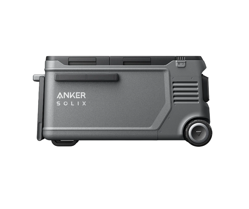 Image of Anker SOLIX EverFrost electric cooler with sturdy gray casing, closed lid, side handle and large wheel, full side profile view on transparent background.