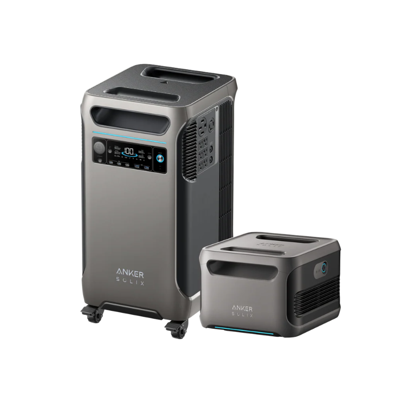 Image of Anker SOLIX portable power station with matching expansion battery, metallic gray housings, digital display and vents visible, angled front and side view on transparent background.