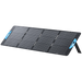 Image of Anker SOLIX portable solar panel fully deployed with integrated kickstand and blue carry handles, black photovoltaic surface, angled front and side view on black background.