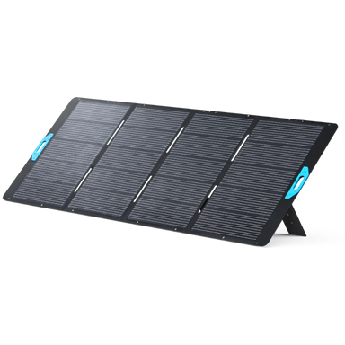 Image of Anker SOLIX portable solar panel fully deployed with integrated kickstand and blue carry handles, large black photovoltaic surface, angled front and side view on black background.