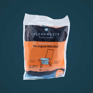 Image of Cleanwaste The Original WAG BAG portable toilet kit in orange and black packaging, front view of sealed bag on solid background.