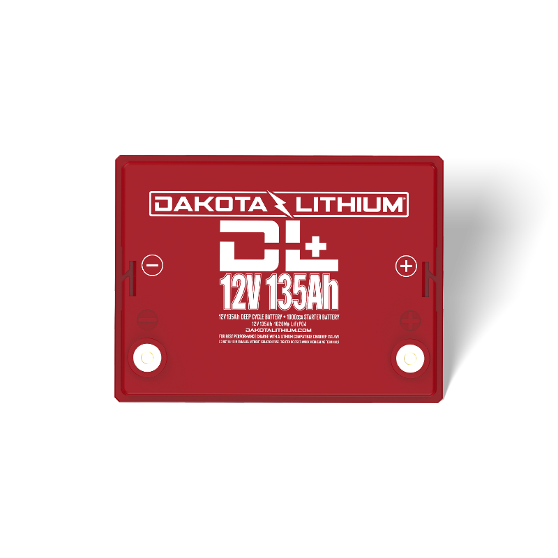 Image of the red top of a Dakota Lithium 12V 135Ah deep cycle battery, showing the positive and negative terminals, front view on a white background