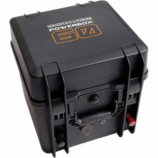 Image of the Dakota Lithium Powerbox 60, a portable battery box with the logo and "Powerbox 60" text in orange on the black case. The image shows an angled view of the sealed box with its handle and various ports