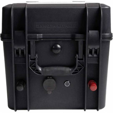 Image of the Dakota Lithium Powerbox 60, a portable battery box shown from a straight-on front view on a white background. The image highlights the front control panel, including the carrying handle, 12V cigarette lighter port, power button, and two battery terminals