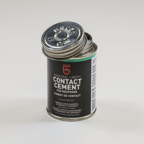Image of Gear Aid Aquaseal Neo contact cement metal can with cap removed, angled front view showing open lid on a light neutral background.