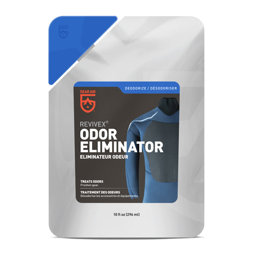 Image of Gear Aid Revivex Odor Eliminator pouch, resealable silver packaging with black and blue label, featuring athletic base layer garment graphic and product branding, front-facing view on white background.