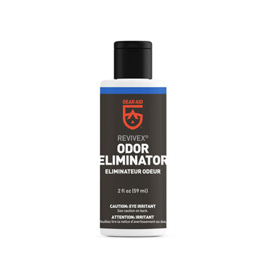 Image of Gear Aid Revivex Odor Eliminator bottle, small white plastic container with black cap and black label, showing product branding and text, front-facing view on white background.