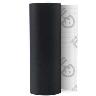 Image of Gear Aid Tenacious Tape black fabric repair roll with peel-off backing partially visible, upright view showing textured material on white background.