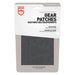 Image of Gear Aid Tenacious Tape Outdoor Gear Patches retail packaging with decorative black patch shapes visible, front-facing product display on white background.