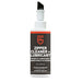 Image of Gear Aid zipper cleaner and lubricant bottle with built-in brush applicator, black and white label, 2 fl oz size, upright front view on white background.