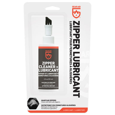 Image of Gear Aid zipper cleaner and lubricant in retail blister packaging with brush applicator visible, black and white label, 2 fl oz bottle, front view on white background.
