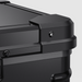 Image of a close-up of a sturdy black corner protector and mounting screw on an ICECO portable refrigerator/freezer, highlighting the robust design and hardware