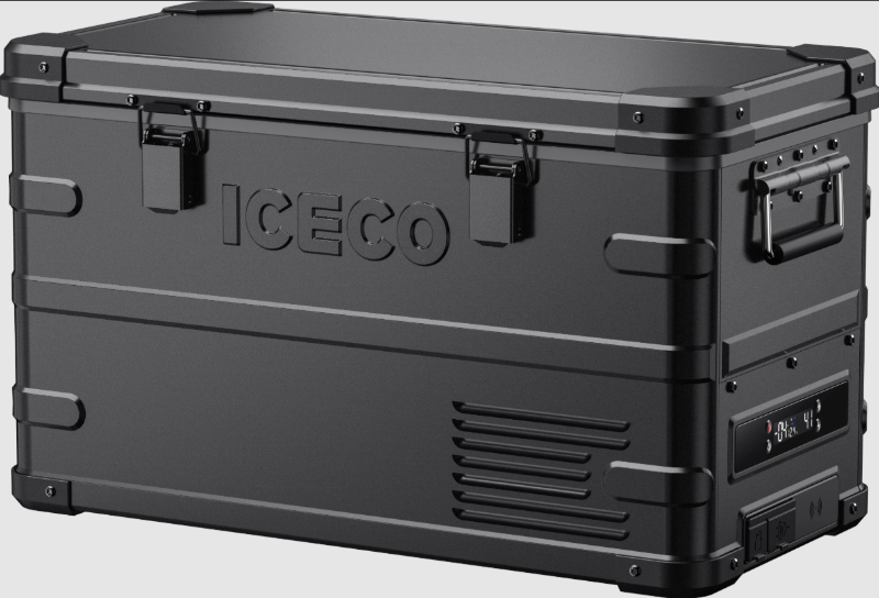 Image of an ICECO portable refrigerator/freezer in a rugged black finish, featuring embossed ICECO branding on the side, heavy-duty latches, and a digital display panel, viewed from an angled front perspective on a grey background