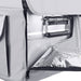Image of a close-up on the handle of an ICECO portable refrigerator/freezer, showing the gray protective cover unzipped to reveal the metallic interior and part of the silver handle with a black grip