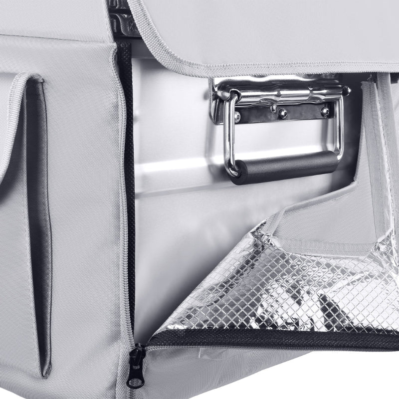 Image of a close-up on the handle of an ICECO portable refrigerator/freezer, showing the gray protective cover unzipped to reveal the metallic interior and part of the silver handle with a black grip